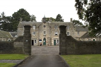 View of main block looking though gateway from E