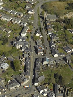 General olique aerial view looking towards the Church, centred on the High Main Street, taken from the S.