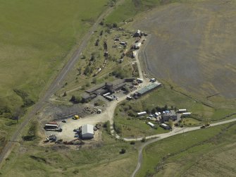 General oblique aerial view centred on the remains of the Minnivey Colliery (now the Scottish Industrial Railway Centre) with the mineral railway adjacent, taken from the WNW.