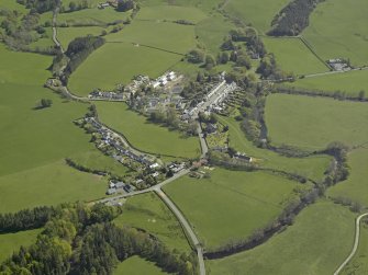 General oblique aerial view centred on village, taken from the W.