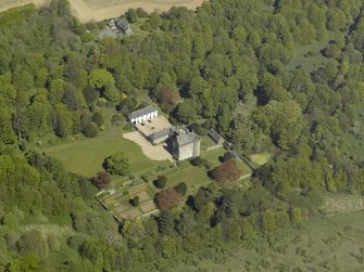 Oblique aerial view centred on the castle and country house, taken from the S.