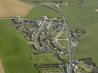 General oblique aerial view of the village, taken from the W.