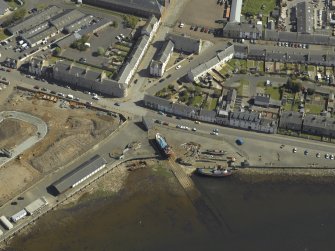 Oblique aerial view centered on the harbour, taken from the NNW.