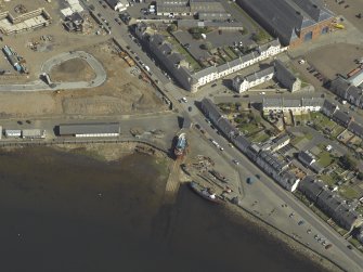 Oblique aerial view centred on the harbour, taken from the NW.