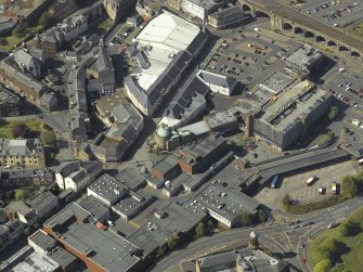 Oblique aerial view looking towards the cross centred on the bank, taken from the SE.