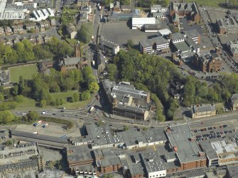 General oblique aerial view centred on the Corn Exchange, taken from the WNW.