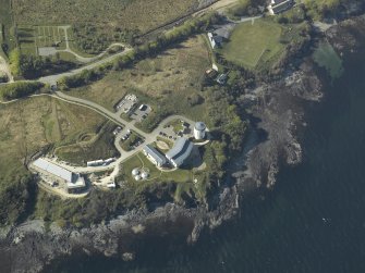 Oblique aerial view centred on the college, taken from the SE.