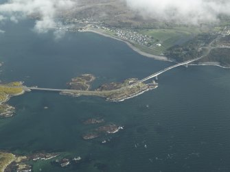 Oblique aerial view centred on the road bridge with the adjacent village of Caol Acain (Kyleakin), taken from the N.