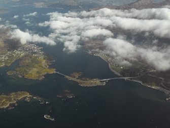 General oblique aerial view looking towards Loch Alsh centred on the road bridge, taken from the W.