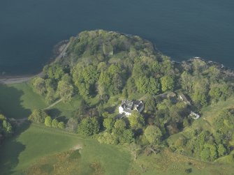 Oblique aerial view of the country house and the remains of the castle, taken from the ENE.