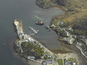 Oblique aerial view centred on the harbour and slipway, taken from the WNW.
