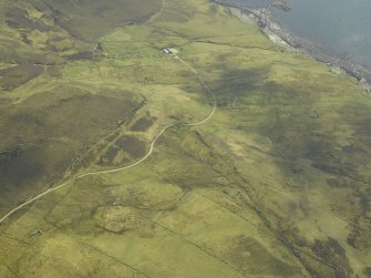 Oblique aerial view centred on the remains of the township, taken from the WNW.