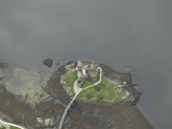 Oblique aerial view centred on the castle, taken from the NE.