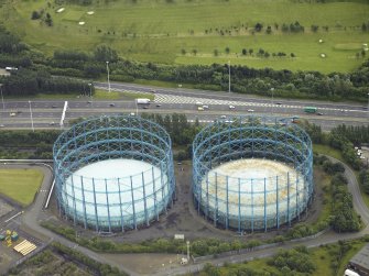 Oblique aerial view centred on the gas holders, taken from the NNW.