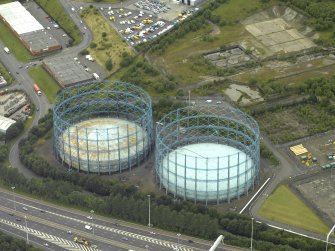 Oblique aerial view centred on the gas holders, taken from the SE.