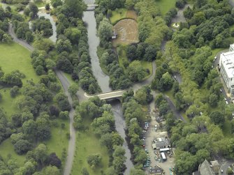 Oblique aerial view centred on the bridge with the band stand adjacent, taken from the SSW.