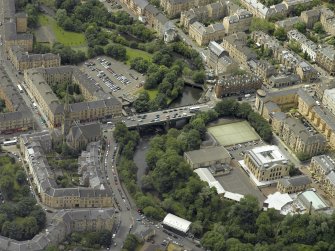 Oblique aerial view centred on the bridge with Glasgow Academy adjacent, taken from the NE.