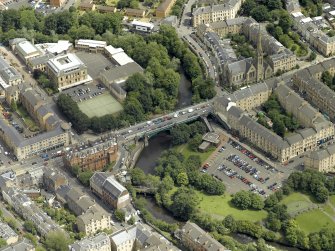 Oblique aerial view centred on the bridge with Glasgow Academy adjacent, taken from the SW.