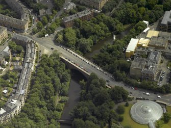 Oblique aerial view centred on the bridge with Kibble Palace adjacent, taken from the NW.