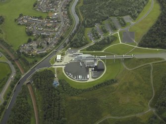 Oblique aerial view centred on the Millenuim Wheel and canal, taken from the W.