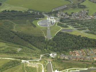 Oblique aerial view centred on the Millenuim Wheel and canal, taken from the S.