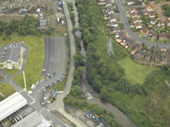 Oblique aerial view centred on the bridge and weir, taken from the SW.