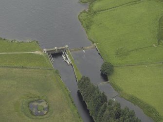 Oblique aerial view centred on the sluice and fish ladder, taken from the NE.