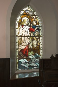 Interior. Nave stained glass window by A Ballantine & Son 1906 . Detail