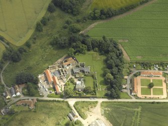 Oblique aerial view centred on the Abbey and church, taken from the W.