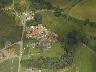 Oblique aerial view centred on the Abbey and church, taken from the S.