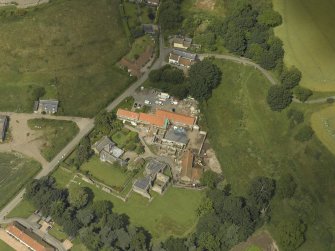 Oblique aerial view centred on the Abbey and church, taken from the SE.