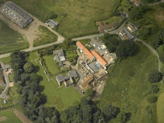 Oblique aerial view centred on the Abbey and church, taken from the N.
