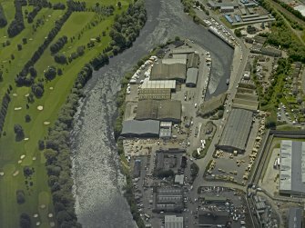 Oblique aerial view centred on the harbour, taken from the NE.