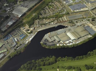 Oblique aerial view centred on the harbour, taken from the SE.