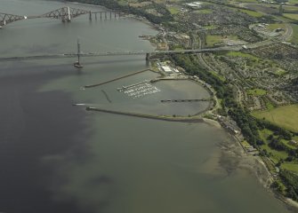 General oblique aerial view looking towards the Forth Bridge and Forth Road Bridge centred on the former Royal Naval Base, taken from the W.
