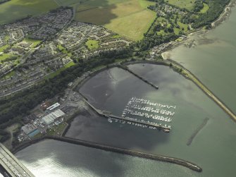 Oblique aerial view centred on the former Royal Naval Base, taken from the NE.