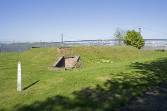 View from ESE showing earth mound and E entrance to shelter.