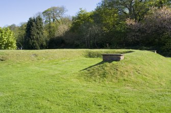 General distant view of officers' wardroom air-raid shelter and part of formal garden from E