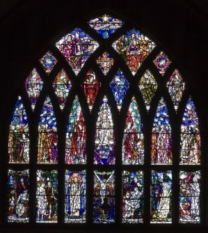 Interior. Chancel E Stained glass window by Douglas Strachan dated 1914 of Christ in Glory