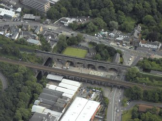 Oblique aerial view centred on the aqueduct and railway viaduct, taken from the NW.