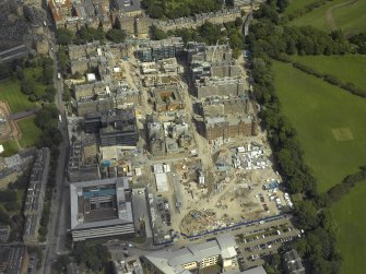 Oblique aerial view centred on the former Royal Infirmary, now Quartermile re-development, taken from the W.