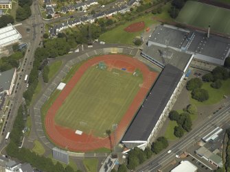 Oblique aerial view centred on the stadium, taken from the WSW.