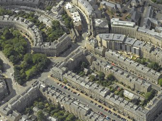 Oblique aerial view centred on St Vincent Street with St Stephen's Church adjacent, taken from the SE.