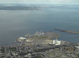 General oblique aerial view centred on Western Harbour and new housing development, taken from the SW.
