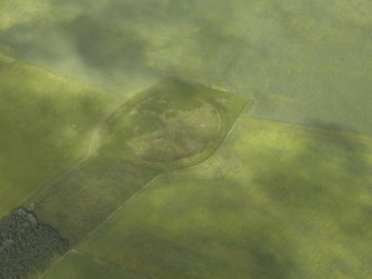 Oblique aerial view centred on the remains of the fort, taken from the W.