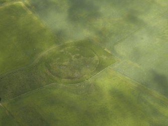 Oblique aerial view centred on the remains of the fort, taken from the SW.