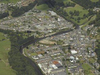 General oblique aerial view centred on the town, taken from the SSE.