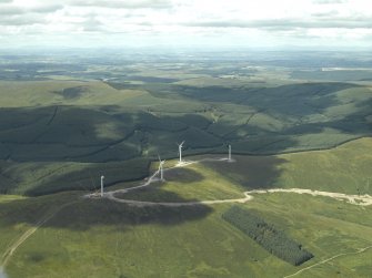 General oblique aerial view centred on the wind farm, taken from the NE.