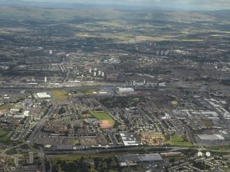 General oblique aerial view centred on the shipyard and industrial estates, taken from the SSW.