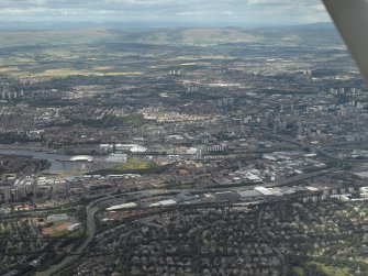 General oblique aerial view of Glasgow centred on the Science Centre, taken from the SSW.